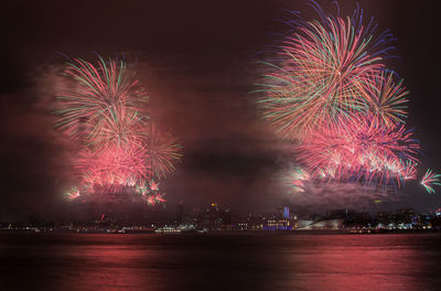 Firework display at night