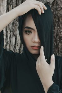 Close-up portrait of young woman