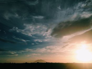 Scenic view of landscape at sunset