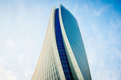 Low angle view of skyscraper against sky