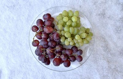 High angle view of grapes in container