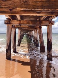 Wooden pier on sea shore