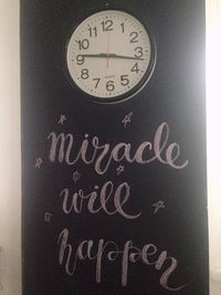 Close-up of text on wall