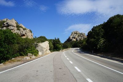 Country road passing through landscape