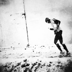 Woman standing by railing
