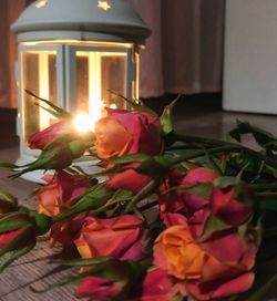 Close-up of rose bouquet on table at home