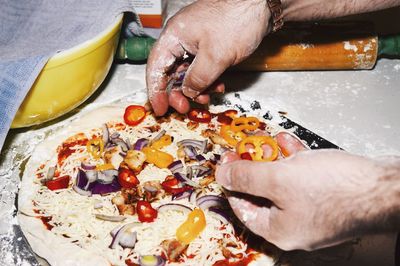 High angle view of man holding food