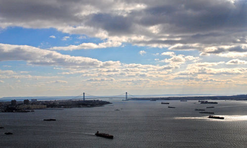 Scenic view of bay bridge against sky