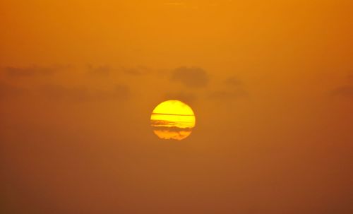 Scenic view of orange sky