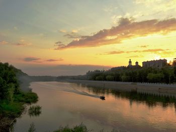 Scenic view of sunset over river