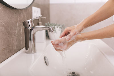 Close-up of sink in bathroom