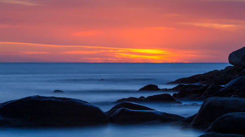 Scenic view of sea against sky during sunset