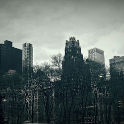 View of buildings against cloudy sky