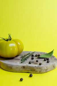 Close-up of yellow fruit on table