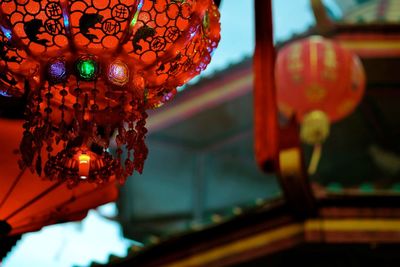 Low angle view of illuminated lantern 