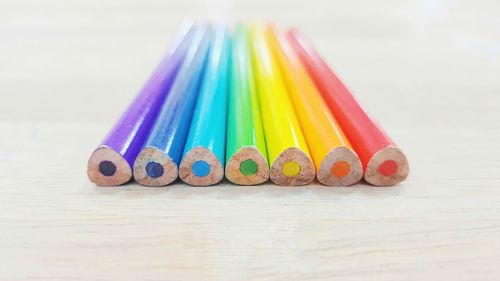 Close-up of colored pencils on table