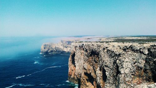 Scenic view of sea against blue sky