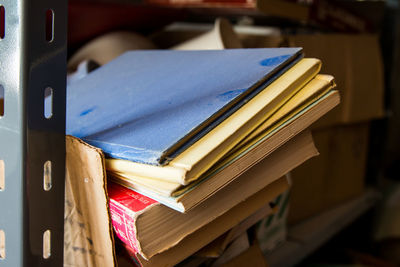 Close-up of book in shelf