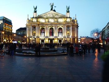 Group of people in front of building