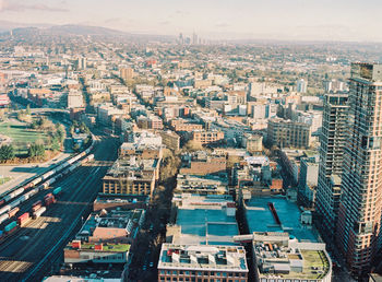 High angle view of modern buildings in city against sky