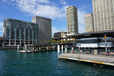 Promenade by bay in city