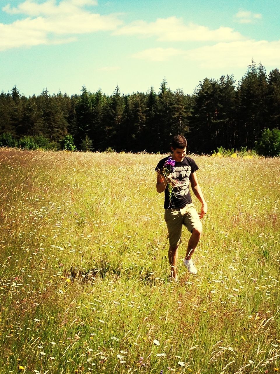 grass, field, lifestyles, full length, leisure activity, casual clothing, sky, grassy, landscape, childhood, person, boys, growth, elementary age, tree, rear view, green color, rural scene