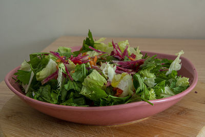 High angle view of chopped vegetables in bowl on table