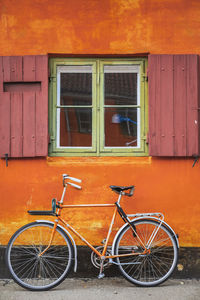 Bicycle parked outside building