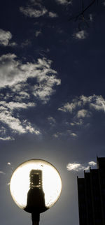 Low angle view of illuminated building against sky