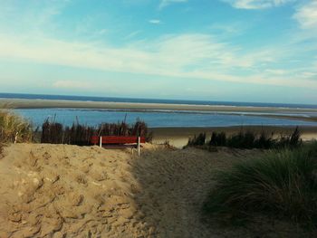 Scenic view of beach against sky