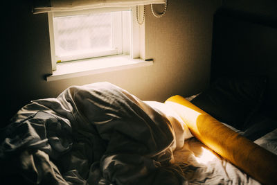 High angle view of sleeping on bed at home