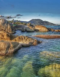 Scenic view of sea shore against sky