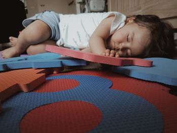 Cute girl sleeping on sofa at home