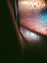 Close-up of rain drops on window