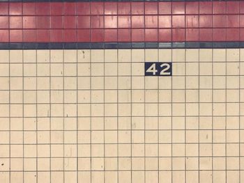 Close-up of text on wall