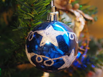 Close-up of object against blue sky