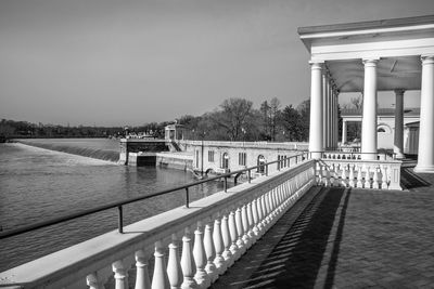 View of bridge over river against buildings