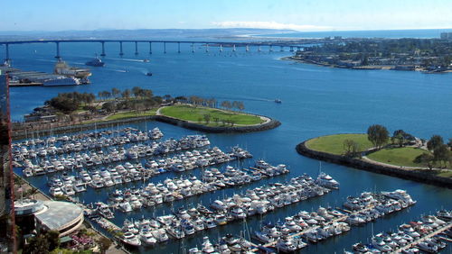 High angle view of boats moored at harbor