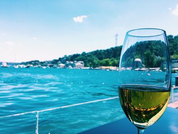 Close-up of wine against sky