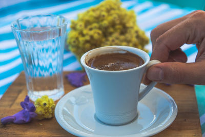 Close-up of coffee cup on table