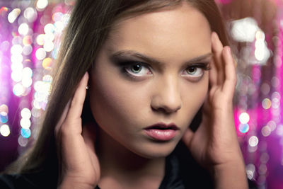 Close-up portrait of young woman