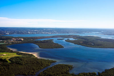 High angle view of beach against blue sky