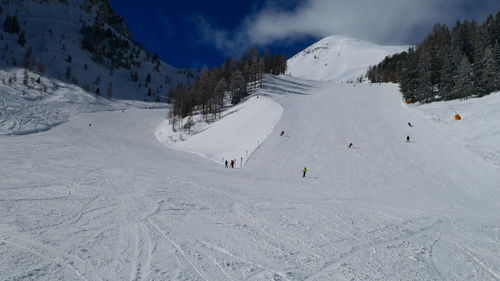 Scenic view of snowcapped mountain against sky