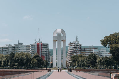 Buildings in city against sky