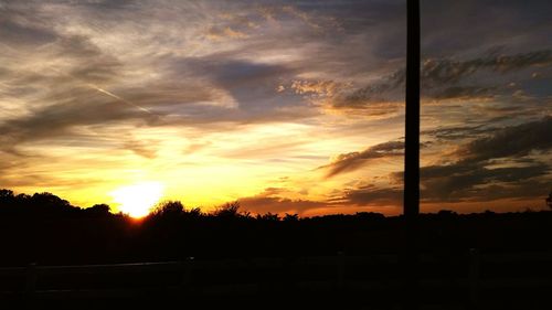 Scenic view of dramatic sky during sunset