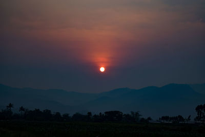 Scenic view of silhouette landscape against sky during sunset