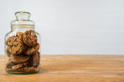 Close-up of cookies in jar on table