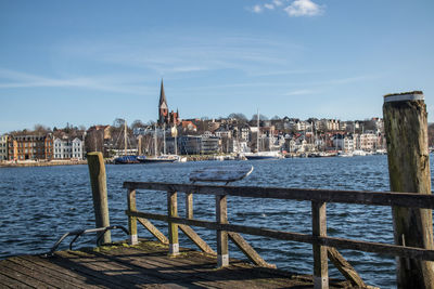 Flensburg city skyline with church from wooden harbor platform