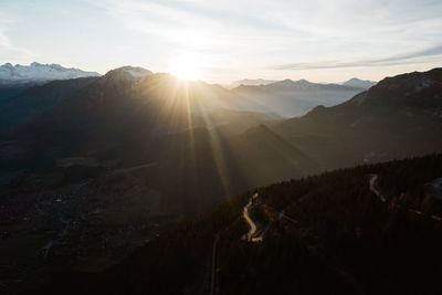 Scenic view of mountains against sky during sunset