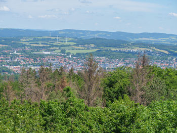 High angle view of trees on landscape against sky